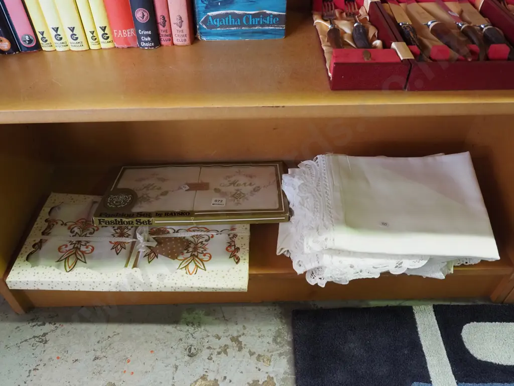 shelf of tablecloths, as new old linen Image 1++