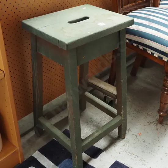 green wooden stool