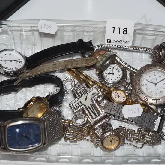 plastic tray of wristwatches
