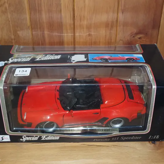 box; diecast scale model of Porsche 911