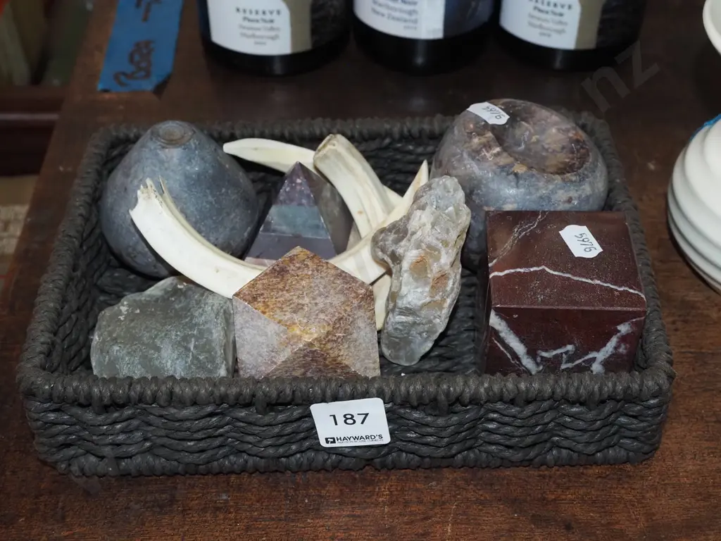 cane basket; animal tusks, stones, kauri gum Image 1++