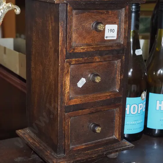 small 4 drawer wood and brass chest H320