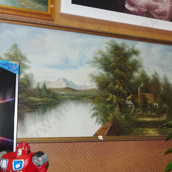 framed oil on board - cottage by lake