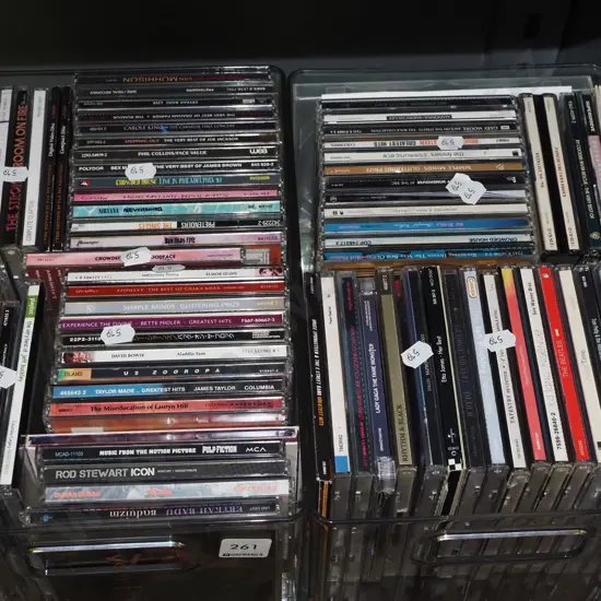 2x plastic tubs of CDs