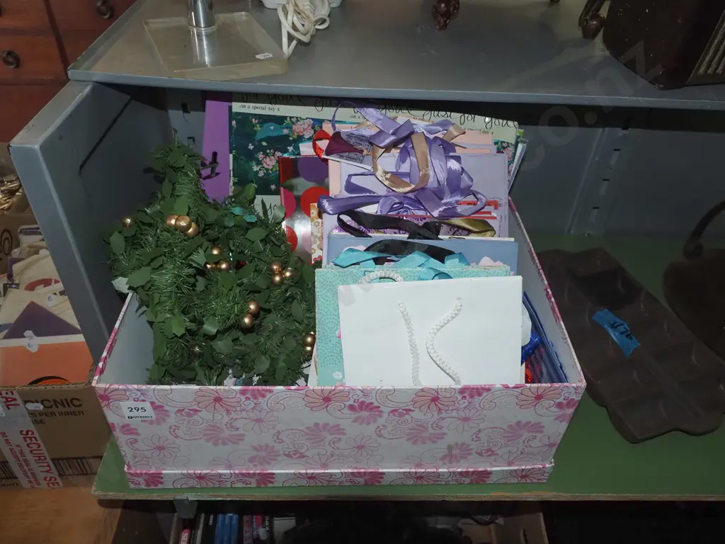 box of gift bags, stickers, craft paper, faux mistletoe Image 1++