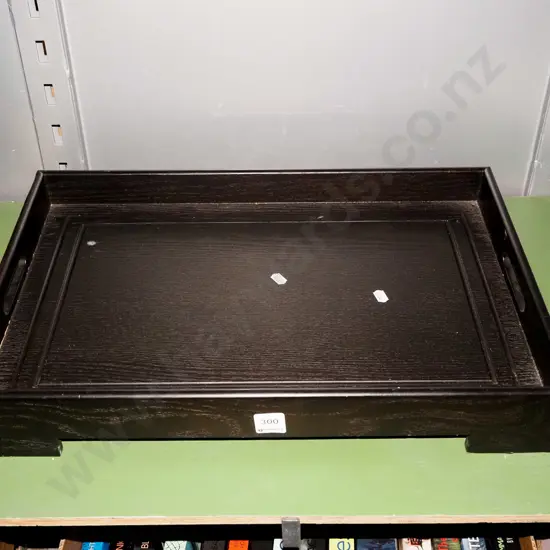 dark stained wooden tray