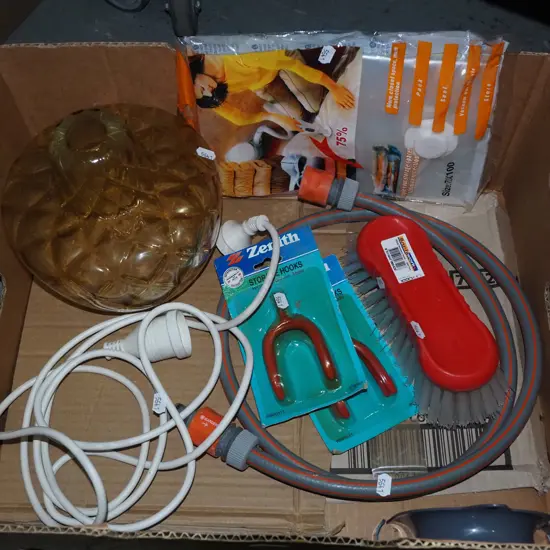 box; extension cord, light fitting, scrubbing brush etc