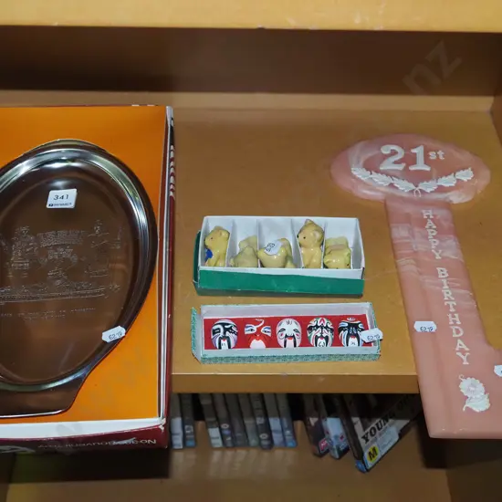 shelf; city of Dunedin tray, ceramic teddy bears etc