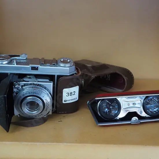 vintage Kodak 35mm camera, opera glasses