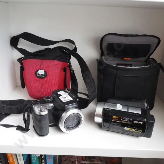 Fuji digital camera, Sony handi cam - both have bags