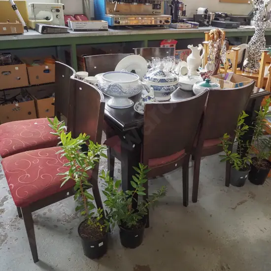 dark stained pine extending dining with 6 upholstered chairs - scratching to table surface