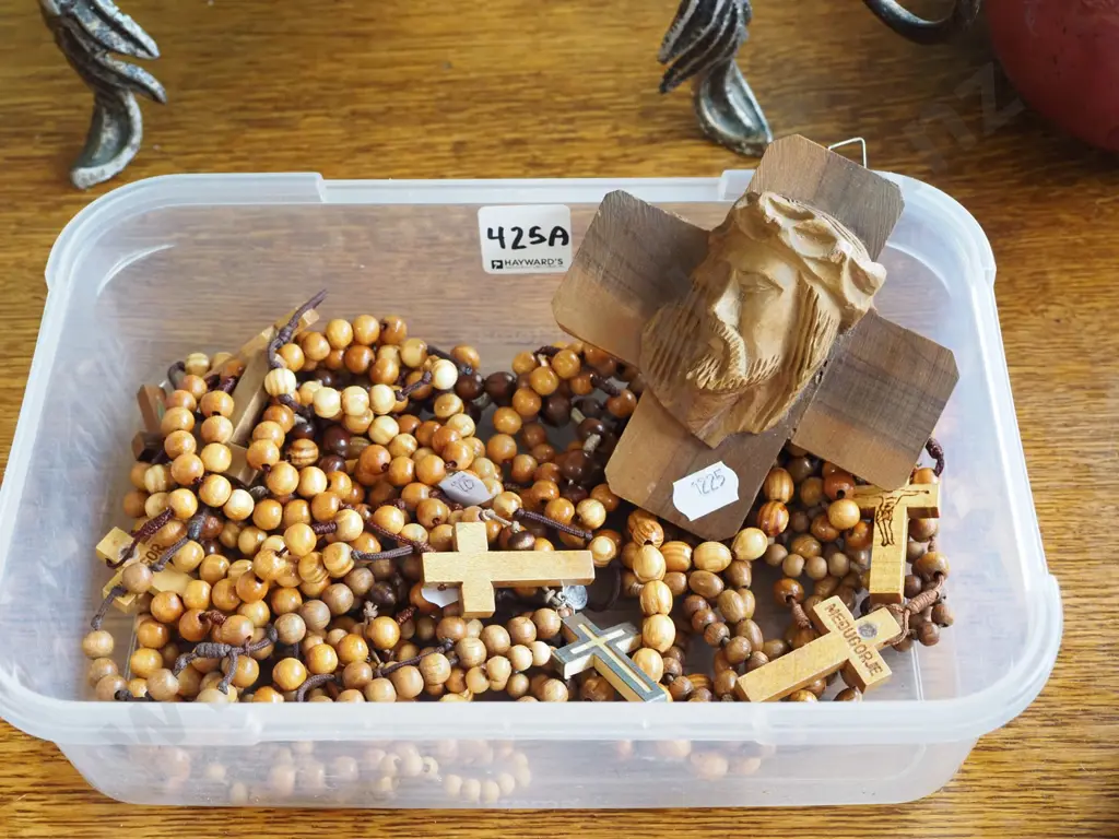wooden rosaries and carved wooden figurine Image 1++