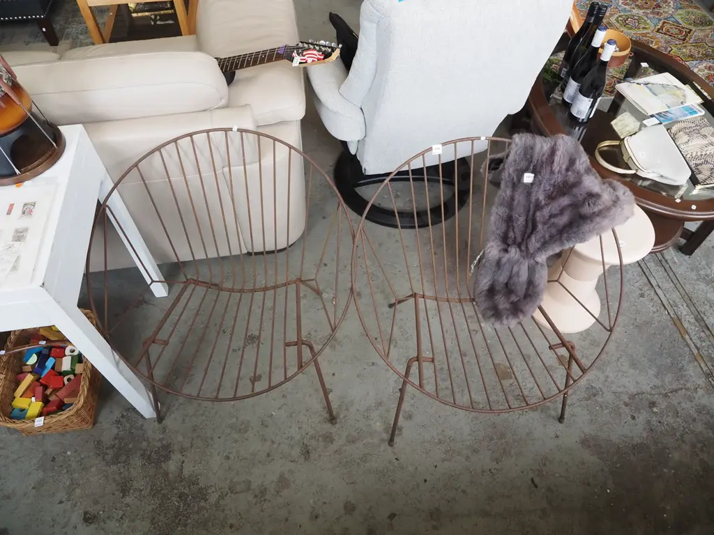 pair of metal moon chairs - some rust Image 1++