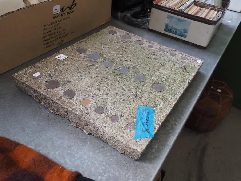 home made concrete tile with imbedded coins Image 1++