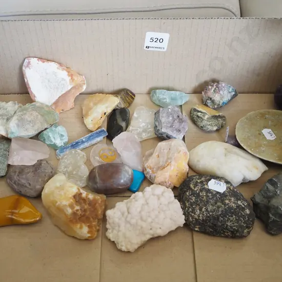 box of polished stones and crystals