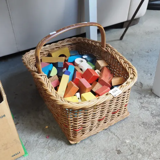 cane basket and childrens blocks