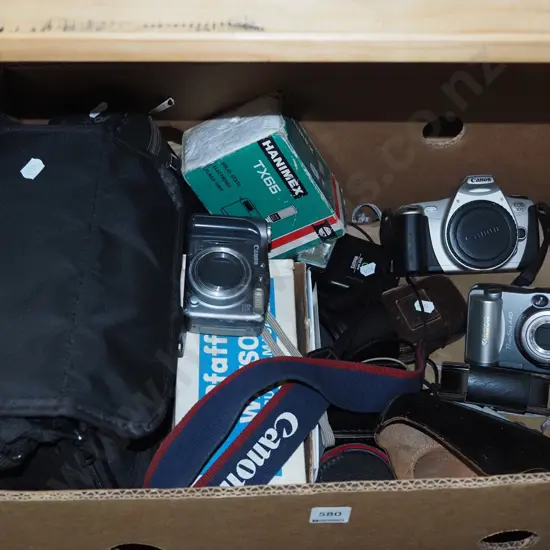 box; camera allsorts, cameras, cases, lenses, flash etc