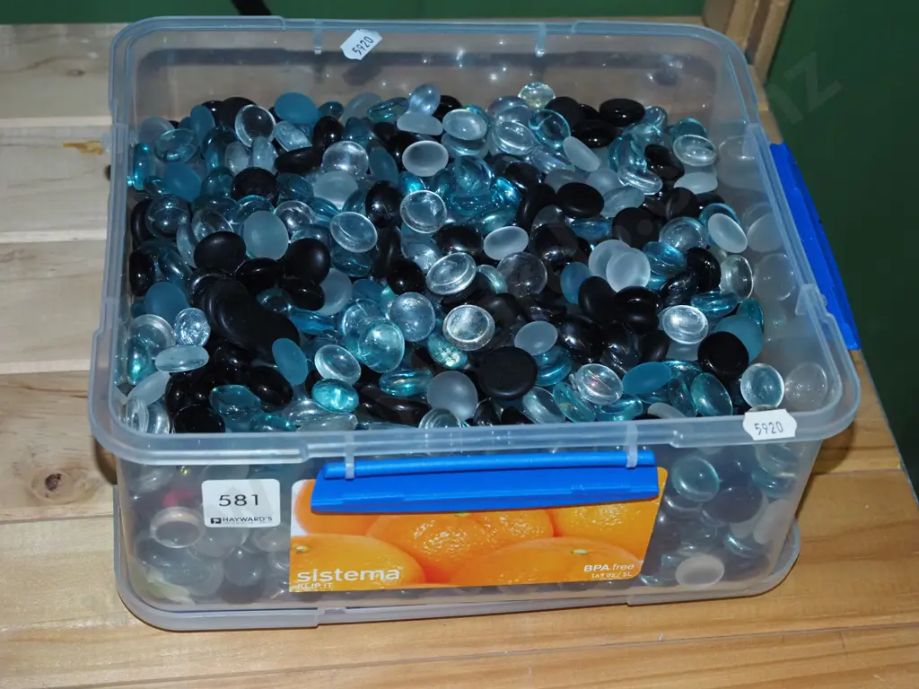 plastic tub of glass beads Image 1++