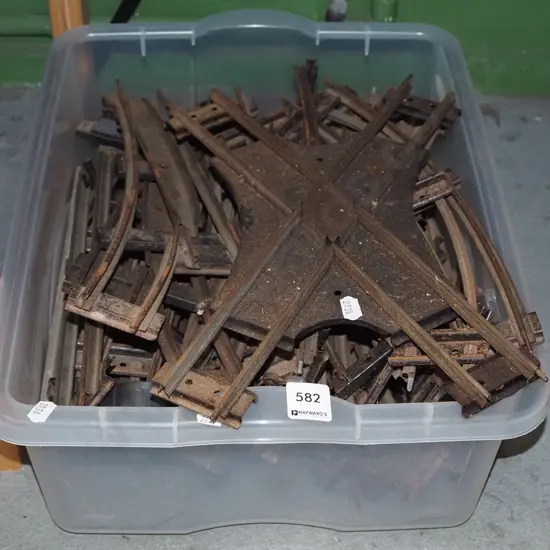 container of rusty Hornby train tracks