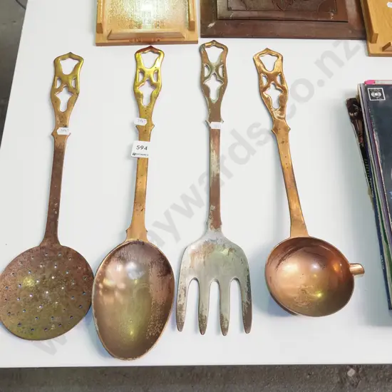 large copper plated kitchen utensils