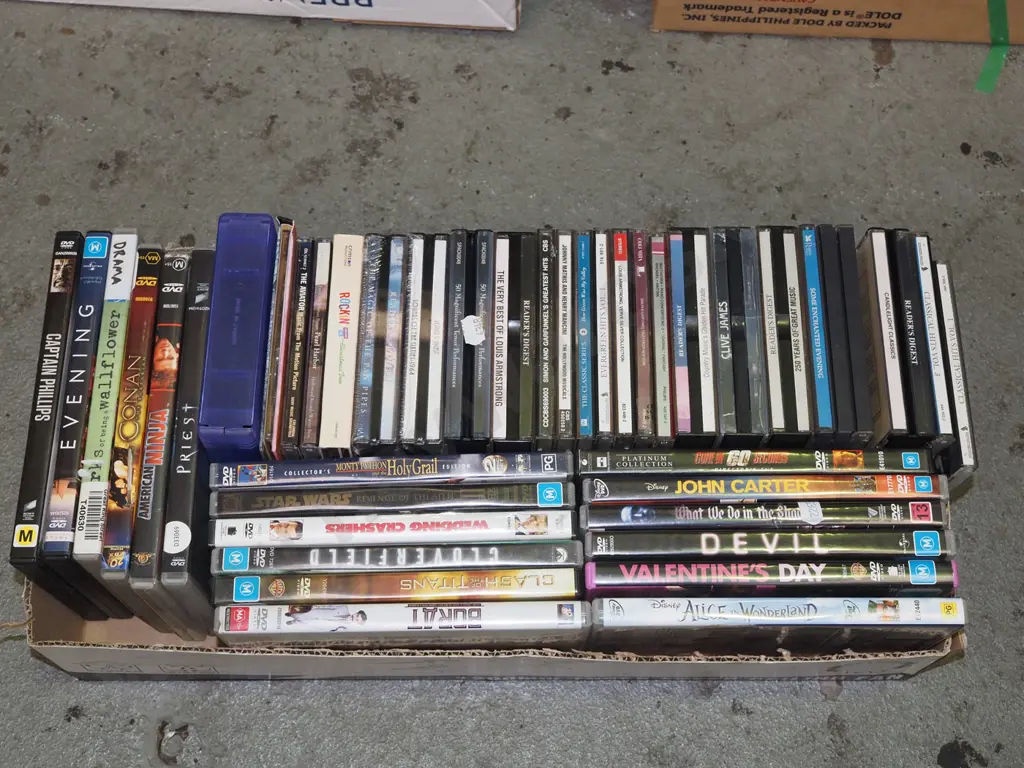 box of DVDs, CDs Image 1++