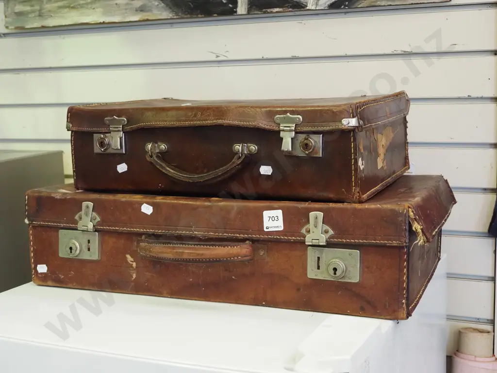 2x bullock hide suitcases Image 1++