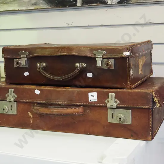 2x bullock hide suitcases