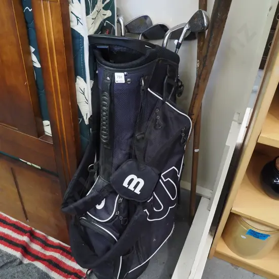golf clubs and bag