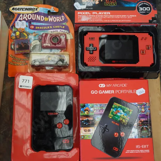 carded matchbox around the world Dracula's Castle set, 2x hand held gaming devices