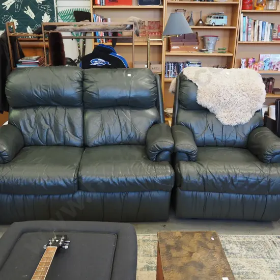 green leather 2 piece lounge suite -  2 seater, single recliner has damage to handle