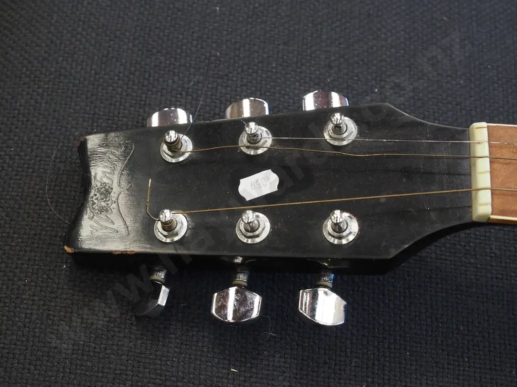 acoustic guitar - missing strings Image 1++