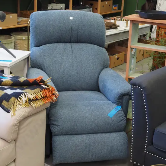 teal upholstered electric reclining armchair 