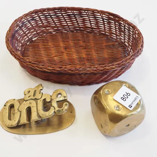 cane basket, large brass dice, brass paper clip