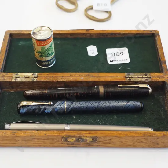 wooden box; 3x pens, miniature tin of Watties Garden peas