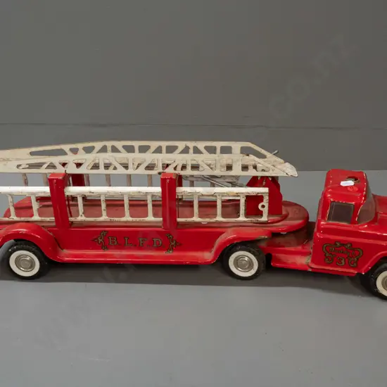 large tin toy vehicle - Buddy L "BLFD" fire engine with spring suspension and ladder - missing cab light and some