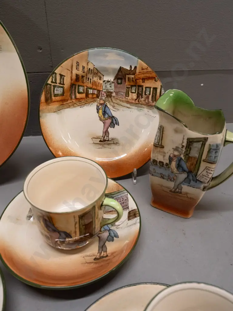 assorted Royal Doulton Dickens Ware: 6 cups & saucers, trio, 2 cups, 2 jugs and a plate - Capt. Cuttle, Poor Jo, Barkis, Image 1++