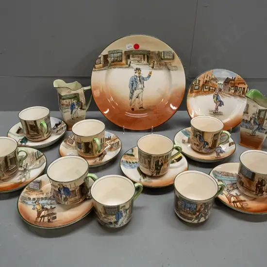 assorted Royal Doulton Dickens Ware: 6 cups & saucers, trio, 2 cups, 2 jugs and a plate - Capt. Cuttle, Poor Jo, Barkis,