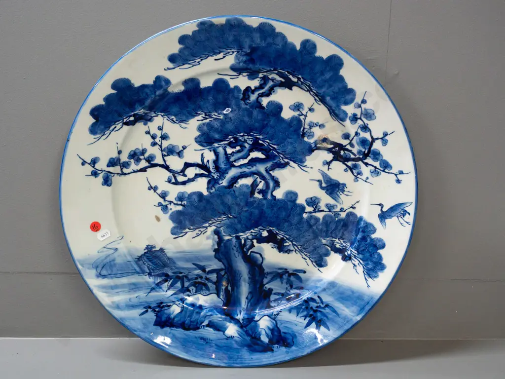 large blue & white asian tree scene wall charger with character mark on back. Some glaze or firing faults and bubbles Image 1++