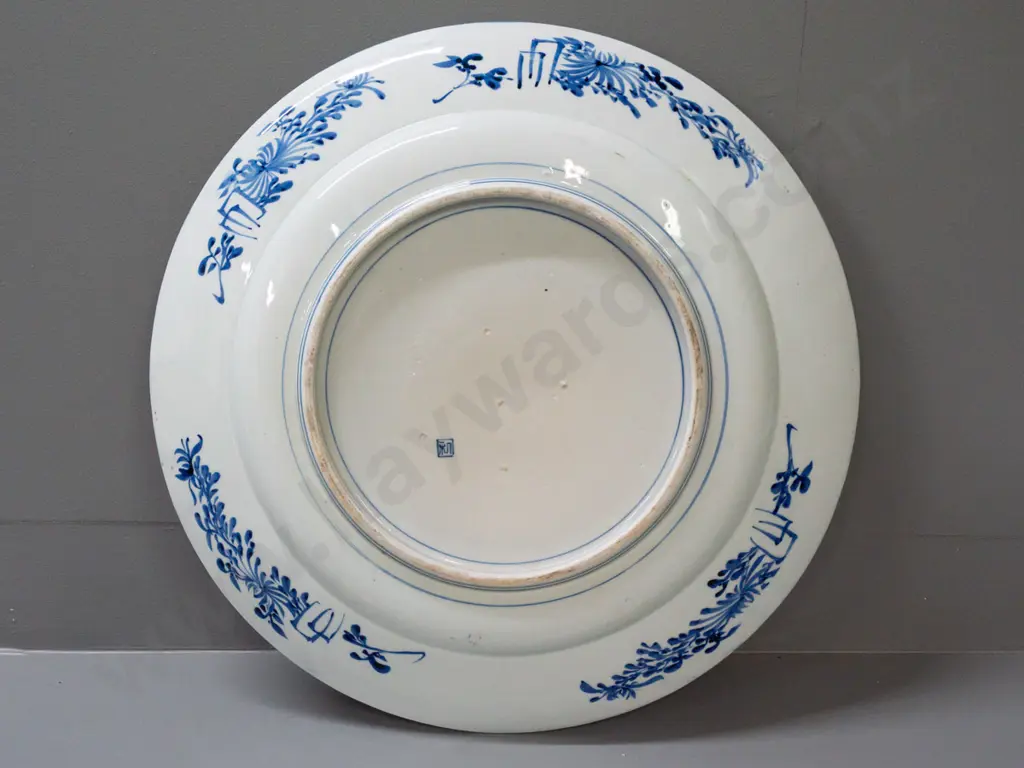 large blue & white asian tree scene wall charger with character mark on back. Some glaze or firing faults and bubbles Image 1++