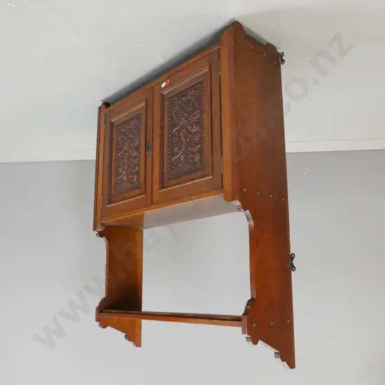 vintage oak wall hanging open back 2 door cupboard with lower shelf, foliate carved door panels, shaped sides and dome-