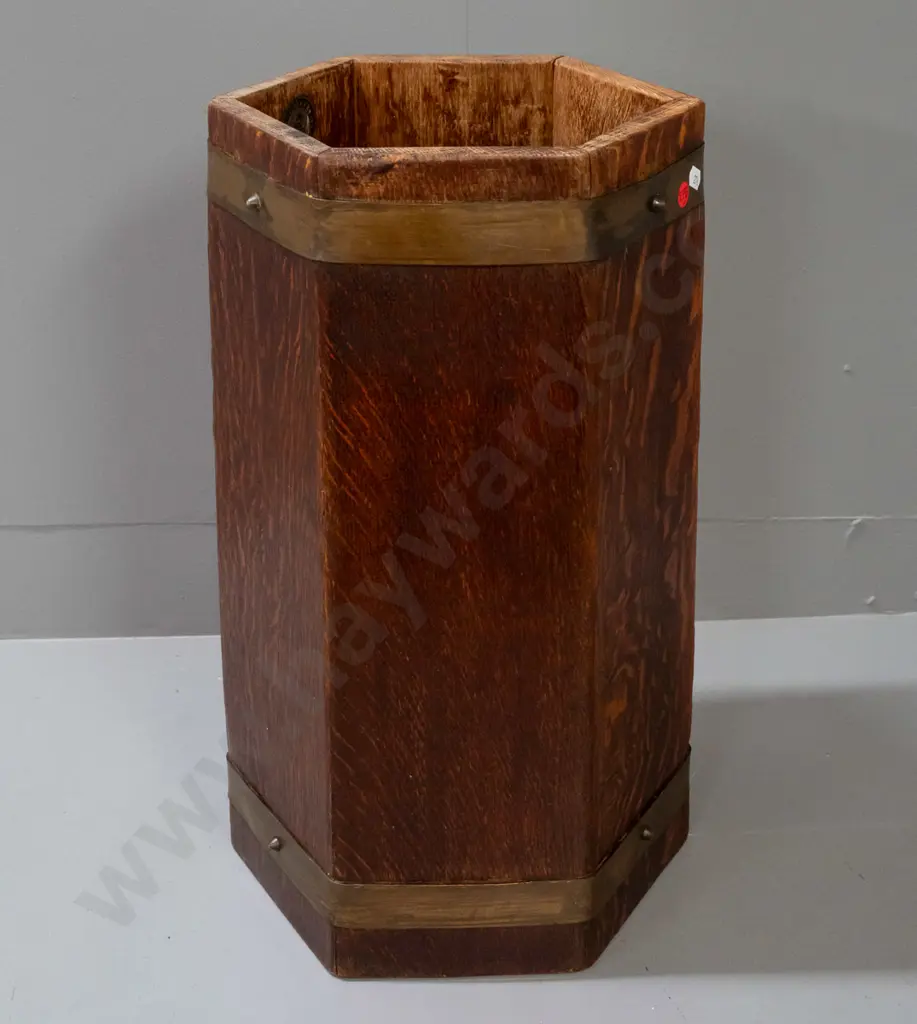 hexagonal oak umbrella / stick stand with drip tray, brass strapping, applied metal plaque w/ RA LIster & Co Ltd England Image 1++