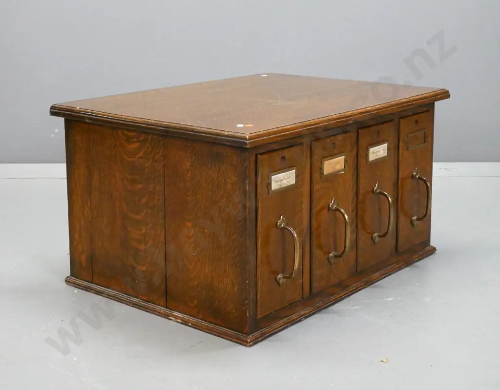 vintage oak desktop filing cabinet with 4 vertical drawers with brass handles and label holders - Image 1++