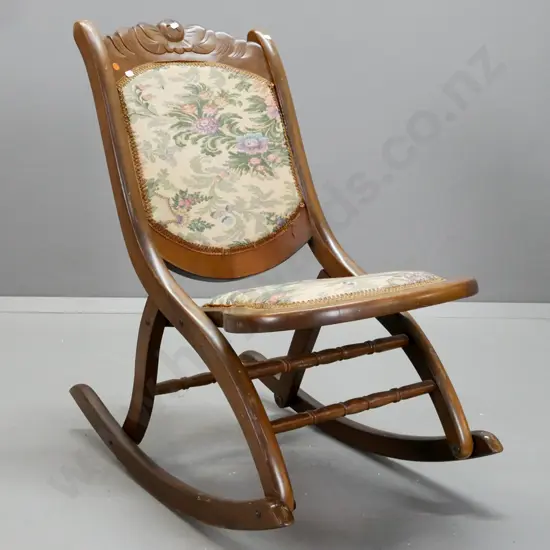 vintage beech and mixed timber folding rocking chair with carved shaped back, tapestry upholstered seat and back - some
