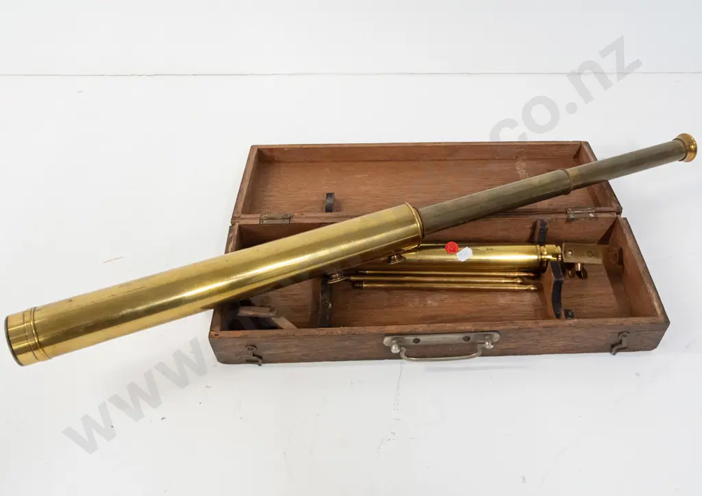 vintage brass telescope marked Dollond London "The Student" and matching tripod stand in fitted oak case. Some damage to Image 1++