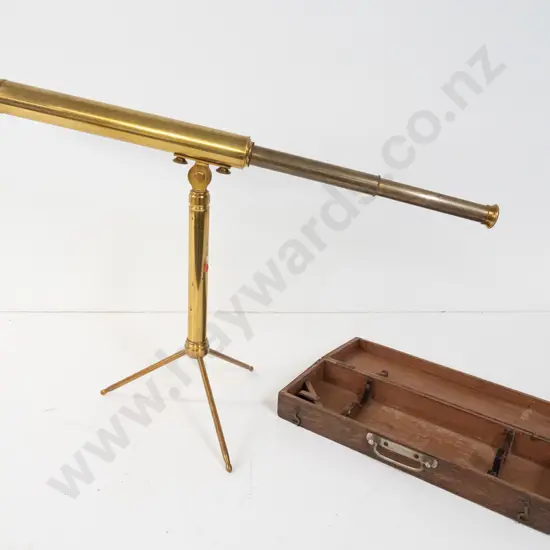 vintage brass telescope marked Dollond London "The Student" and matching tripod stand in fitted oak case. Some damage to