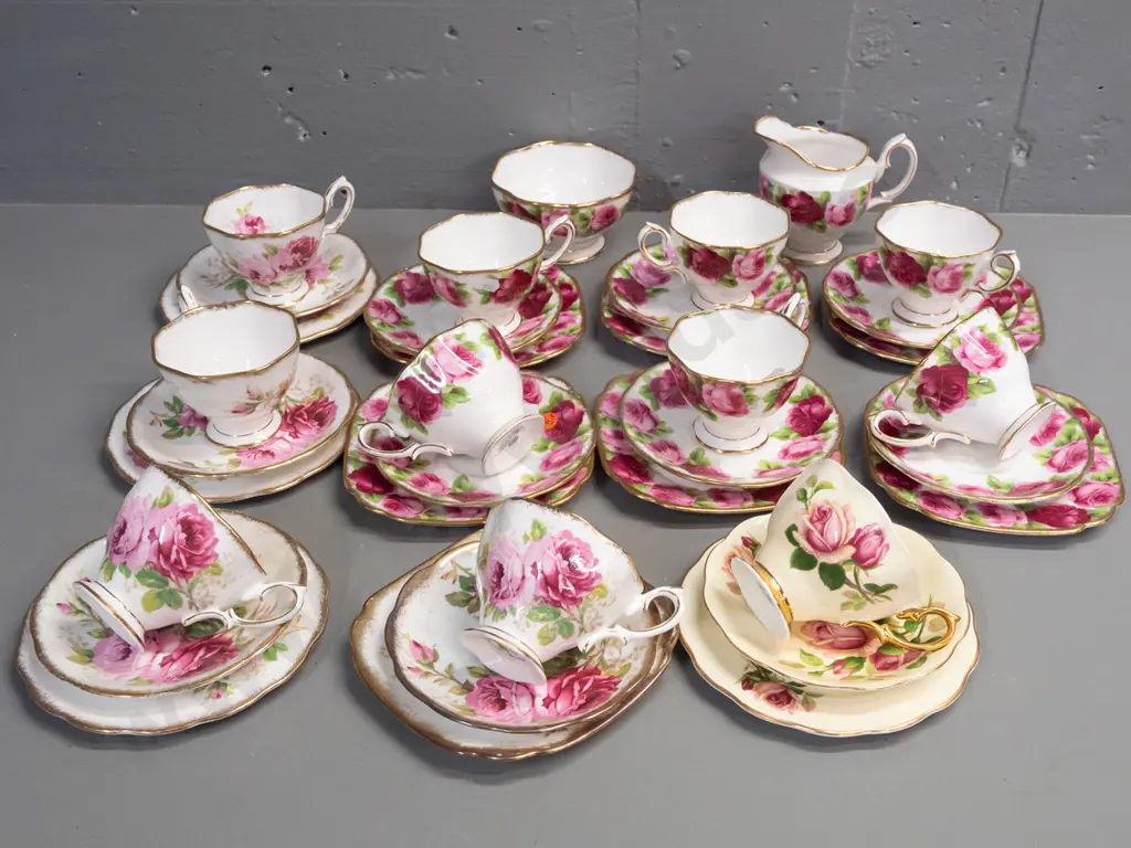 Royal Albert tea ware - 6 Old Country Rose trios with cream & sugar, 4 American Beauty trios and one other Image 1++