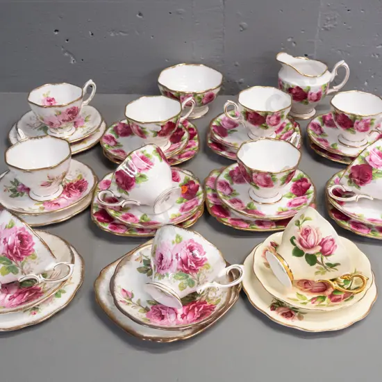 Royal Albert tea ware - 6 Old Country Rose trios with cream & sugar, 4 American Beauty trios and one other