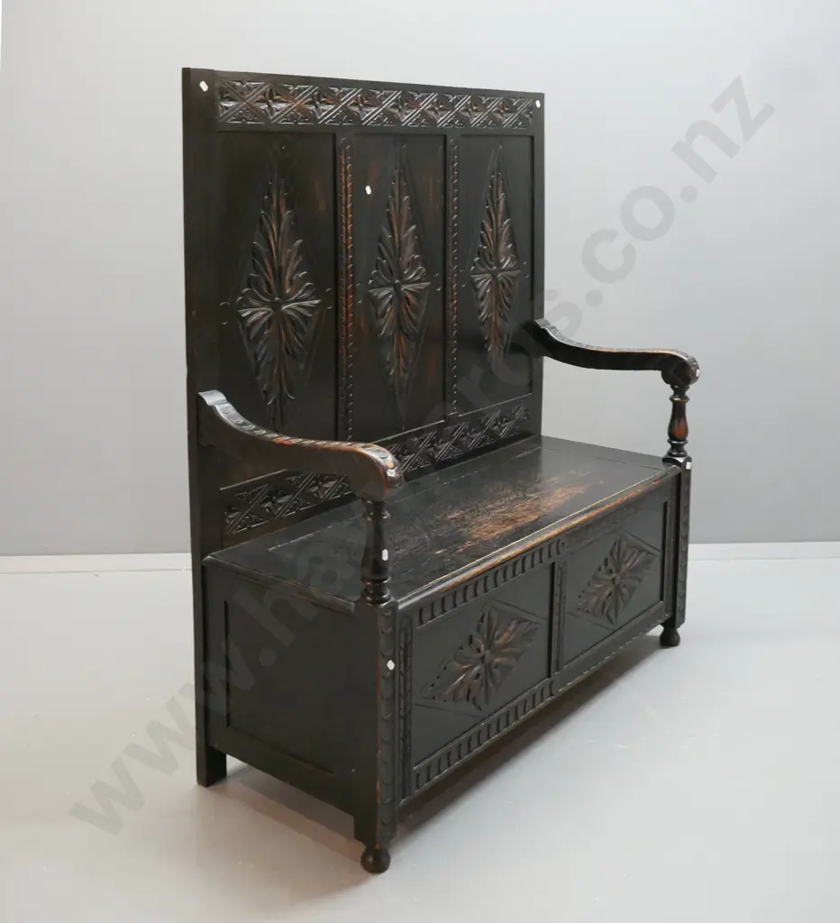 Victorian oak gothic revival settle with foliate diamond carved 3-panel back, arms and 2-panel front, lift up seat. Has Image 1++