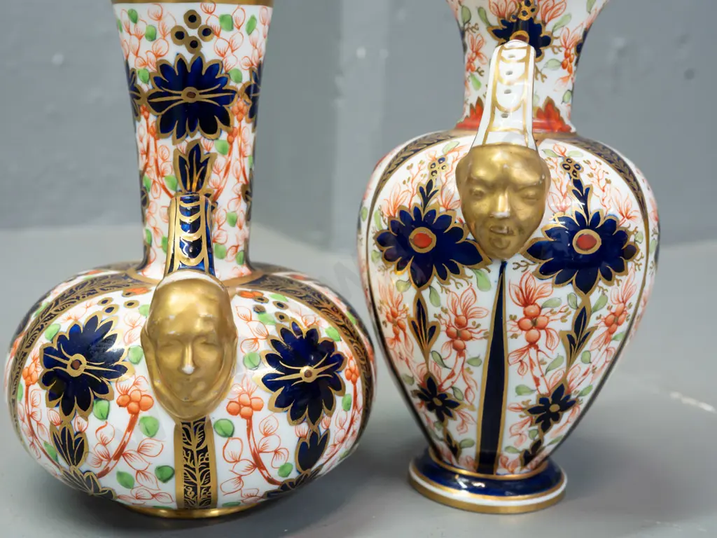 2 vintage Royal Crown Derby imari pattern handled vases - both with wear to gilt on handles, taller one has small chip Image 1++