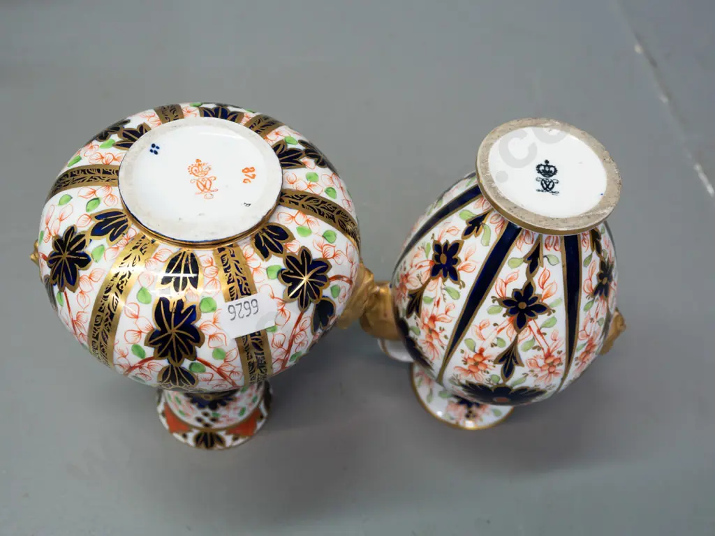 2 vintage Royal Crown Derby imari pattern handled vases - both with wear to gilt on handles, taller one has small chip Image 1++